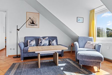 Meeresblick Meeresblick 507 Kühlungsborn - Wohn-/Essbereich mit Couch im kbmb507, Meerblick 507, Ostseeallee 45 in Kühlungsborn