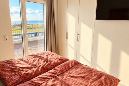 NordseeResort Friesland NordseeResort Friesland 48-7 Schillig - Schlafzimmer mit Doppelbett im sinf48-7, NordseeResort Friesland 48-7 in Schillig