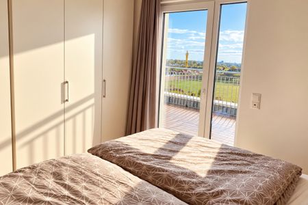 NordseeResort Friesland NordseeResort Friesland 48-7 Schillig - Schlafzimmer mit Doppelbett im sinf48-7, NordseeResort Friesland 48-7 in Schillig