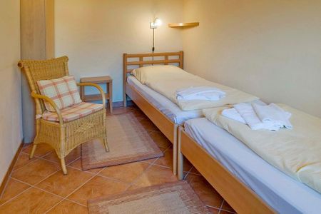 Dünenschloss Dünenschloss 1-10 Kühlungsborn - Schlafzimmer mit zwei Einzelbetten