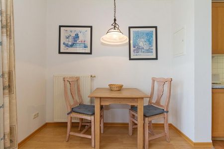 Meeresblick Meeresblick 421 Kühlungsborn - Wohn-Essbereich mit Esstisch und Sitzgelegenheit
