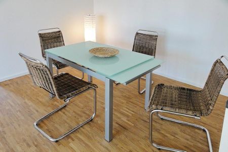 DünenResort Binz DünenResort Binz 114 Rügen - Wohn-Essbereich mit Esstisch und Sitzgelegenheit