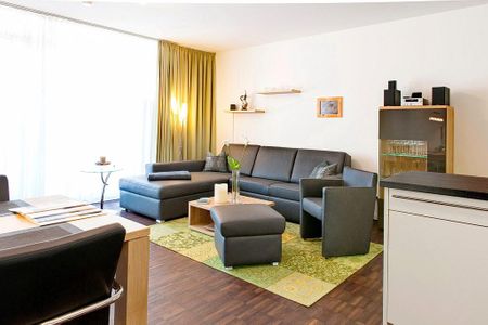 DünenResort Binz DünenResort Binz 117 Rügen - Wohn-Essbereich mit Couch