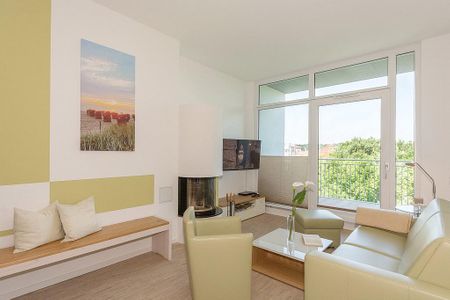DünenResort Binz DünenResort Binz 142 Rügen - Wohn-Essbereich mit Couch