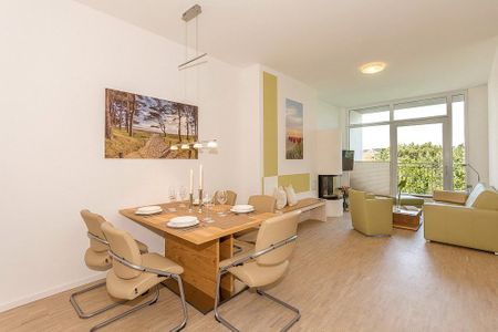 DünenResort Binz DünenResort Binz 142 Rügen - Wohn-Essbereich mit Esstisch und Sitzgelegenheit