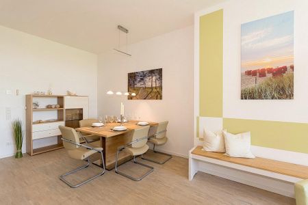 DünenResort Binz DünenResort Binz 142 Rügen - Wohn-Essbereich mit Esstisch und Sitzgelegenheit