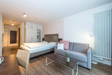 Apartmentvilla Anna See Apartmentvilla Anna See 1-01 Langeoog - Wohn-Schlafbereich mit Couch