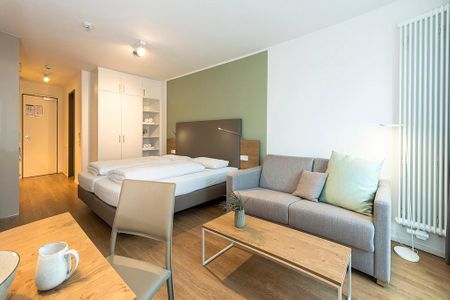 Apartmentvilla Anna See Apartmentvilla Anna See 1-02 Langeoog - Wohn-Schlafbereich mit Couch