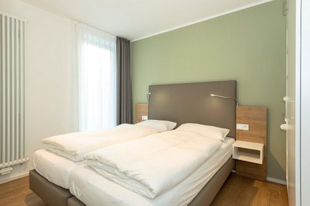 Apartmentvilla Anna See Apartmentvilla Anna See 1-03 Langeoog - Schlafzimmer mit Doppelbett
