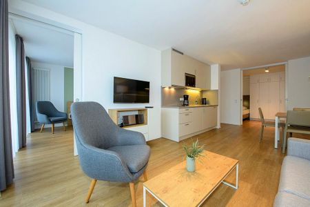 Apartmentvilla Anna See Apartmentvilla Anna See 1-14 Langeoog - Wohn-Essbereich mit TV und Küchenzeile