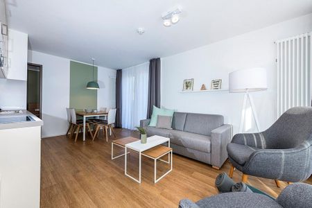 Apartmentvilla Anna See Apartmentvilla Anna See 1-17 Langeoog - Wohn-Essbereich mit Couch