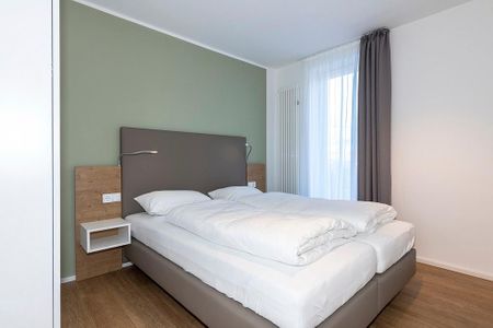 Apartmentvilla Anna See Apartmentvilla Anna See 1-17 Langeoog - Schlafzimmer mit Doppelbett