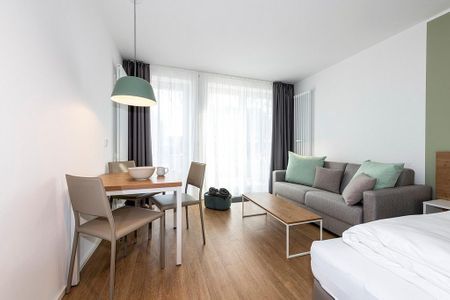 Apartmentvilla Anna See Apartmentvilla Anna See 1-18 Langeoog - Wohn-Schlafbereich mit Sitzgelegenheit