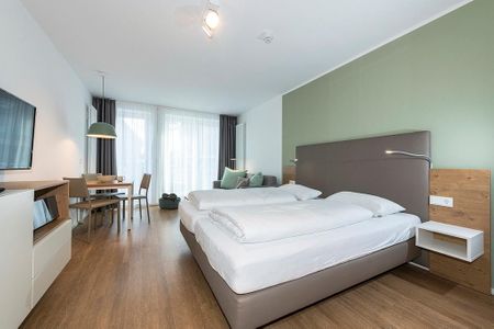 Apartmentvilla Anna See Apartmentvilla Anna See 1-18 Langeoog - Wohn-Schlafbereich mit Doppelbett