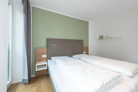 Apartmentvilla Anna See Apartmentvilla Anna See 2-02 Langeoog - Schlafzimmer mit Doppelbett