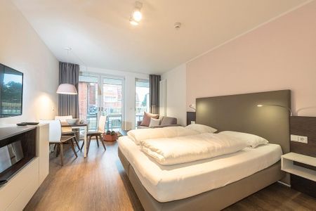 Apartmentvilla Anna See Apartmentvilla Anna See 2-03 Langeoog - Wohn-Schlafbereich mit Doppelbett