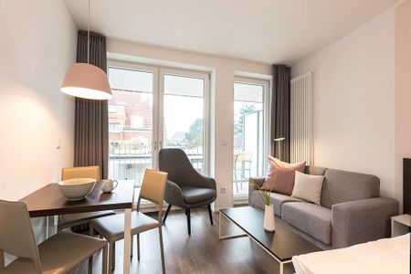 Apartmentvilla Anna See Apartmentvilla Anna See 2-05 Langeoog - Wohn-Essbereich mit Couch