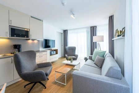Apartmentvilla Anna See Apartmentvilla Anna See 1-10 Langeoog - Wohn-Essbereich mit TV und Küchenzeile