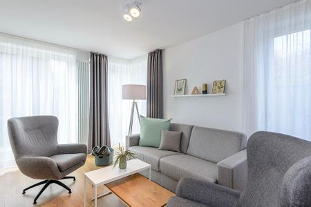 Apartmentvilla Anna See Apartmentvilla Anna See 1-10 Langeoog - Wohn-Essbereich mit Couch