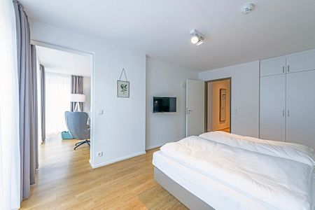 Apartmentvilla Anna See Apartmentvilla Anna See 1-10 Langeoog - Schlafzimmer mit TV