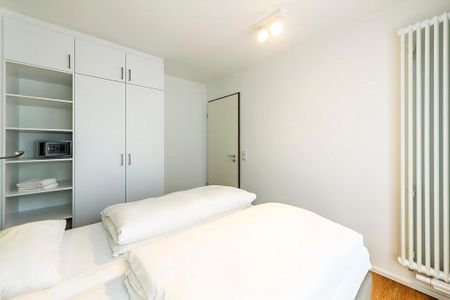 Apartmentvilla Anna See Apartmentvilla Anna See 1-10 Langeoog - Schlafzimmer mit Doppelbett und Kleiderschrank