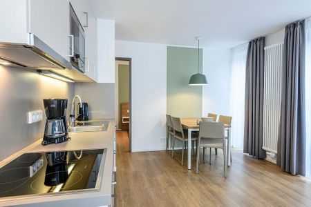 Apartmentvilla Anna See Apartmentvilla Anna See 1-11 Langeoog - Wohn-Essbereich mit Esstisch