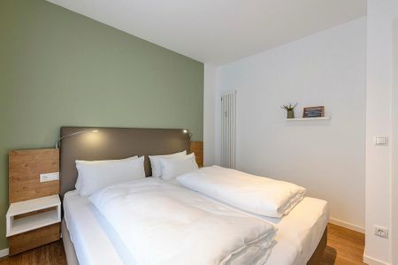 Deichhäuser Anna Küste Deichhäuser Anna Küste 1-10 Bensersiel - Schlafzimmer mit Doppelbett
