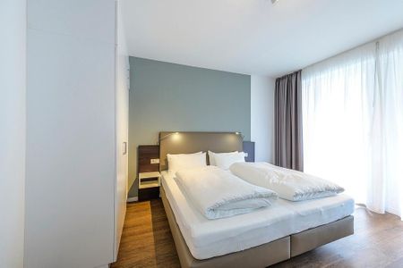 Deichhäuser Anna Küste Deichhäuser Anna Küste 1-11 Bensersiel - Schlafzimmer mit Doppelbett