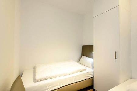Deichhäuser Anna Küste Deichhäuser Anna Küste 1-11 Bensersiel - Schlafzimmer mit zwei Einzelbetten
