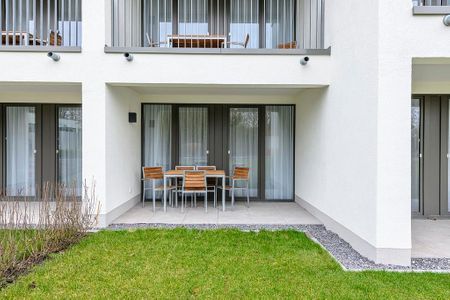 Deichhäuser Anna Küste Deichhäuser Anna Küste 1-11 Bensersiel - Terrasse mit Garten und Sitzgelegenheiten
