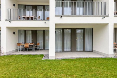 Deichhäuser Anna Küste Deichhäuser Anna Küste 1-11 Bensersiel - Terrasse mit Garten und Sitzgelegenheiten