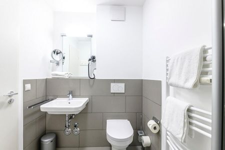 Deichhäuser Anna Küste Deichhäuser Anna Küste 1-12 Bensersiel - Badezimmer mit WC und Waschtisch