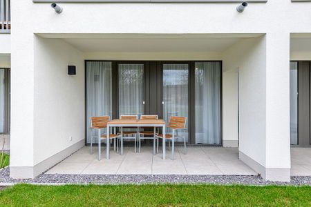 Deichhäuser Anna Küste Deichhäuser Anna Küste 1-13 Bensersiel - Terrasse mit Garten und Sitzgelegenheiten