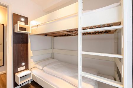 Deichhäuser Anna Küste Deichhäuser Anna Küste 1-20 Bensersiel - Schlafzimmer mit Stapelbett