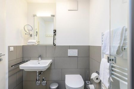 Deichhäuser Anna Küste Deichhäuser Anna Küste 1-32 Bensersiel - Badezimmer mit Waschtisch und WC
