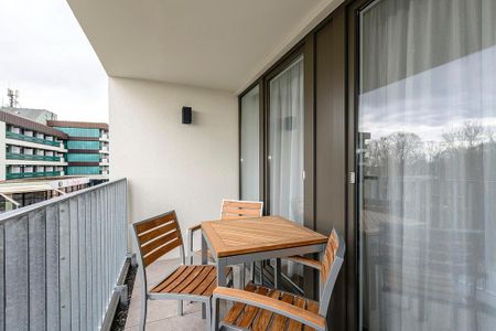 Deichhäuser Anna Küste Deichhäuser Anna Küste 1-32 Bensersiel - Balkon mit Sitzgelegenheiten