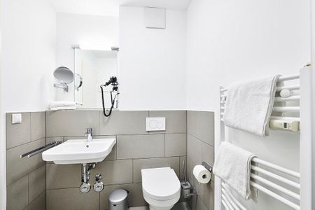 Deichhäuser Anna Küste Deichhäuser Anna Küste 2-12 Bensersiel - Badezimmer mit Waschtisch und WC