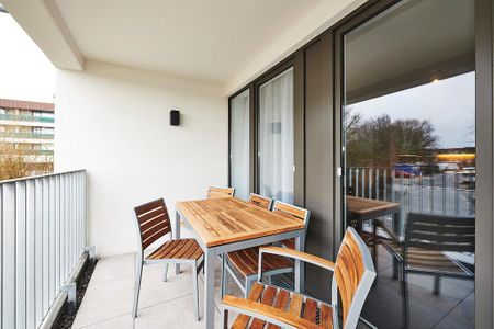 Deichhäuser Anna Küste Deichhäuser Anna Küste 2-20 Bensersiel - Balkon mit Sitzgelegenheiten