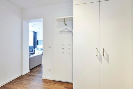 Deichhäuser Anna Küste Deichhäuser Anna Küste 2-21 Bensersiel - Flur mit Kleiderschrank