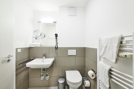 Deichhäuser Anna Küste Deichhäuser Anna Küste 2-22 Bensersiel - Badezimmer mit Waschtisch und WC