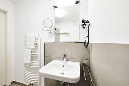 Deichhäuser Anna Küste Deichhäuser Anna Küste 2-23 Bensersiel - Badezimmer mit Waschtisch