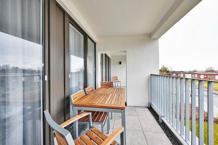 Deichhäuser Anna Küste Deichhäuser Anna Küste 2-23 Bensersiel - Balkon mit Sitzgelegenheiten