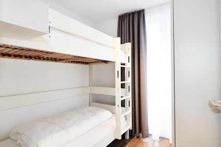 Deichhäuser Anna Küste Deichhäuser Anna Küste 2-30 Bensersiel - Schlafzimmer mit Stapelbett