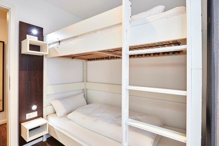 Deichhäuser Anna Küste Deichhäuser Anna Küste 2-30 Bensersiel - Schlafzimmer mit Stapelbett