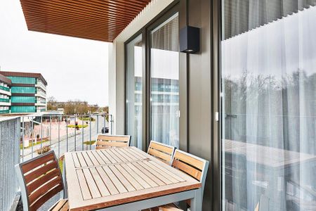 Deichhäuser Anna Küste Deichhäuser Anna Küste 2-30 Bensersiel - Balkon mit Sitzgelegenheiten