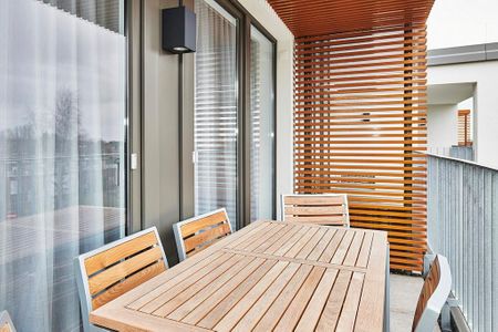 Deichhäuser Anna Küste Deichhäuser Anna Küste 2-30 Bensersiel - Balkon mit Sitzgelegenheiten