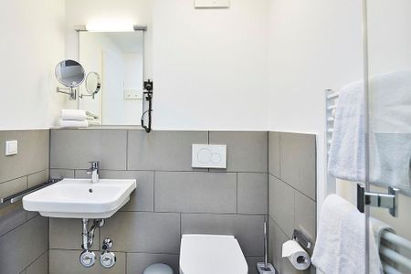 Deichhäuser Anna Küste Deichhäuser Anna Küste 2-32 Bensersiel - Badezimmer mit Waschtisch und WC