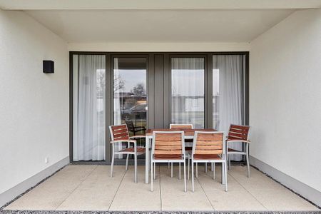 Deichhäuser Anna Küste Deichhäuser Anna Küste 3-10 Bensersiel - Terrasse mit Sitzgelegenheiten