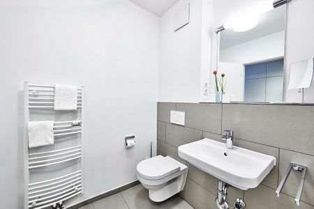 Deichhäuser Anna Küste Deichhäuser Anna Küste 3-11 Bensersiel - Badezimmer mit Waschtisch und WC