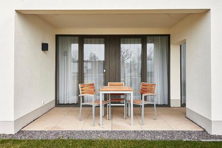 Deichhäuser Anna Küste Deichhäuser Anna Küste 3-13 Bensersiel - Terrasse mit Sitzgelegenheiten